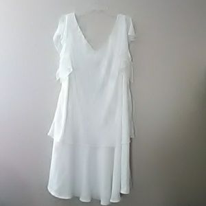 Ivory sleevless dress.